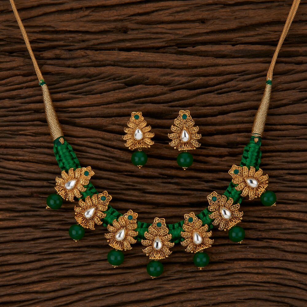 Beruzu - Green Bead Accents and Kundan - Studded Leaf Motifs Necklace Set with Earrings - Beruzu