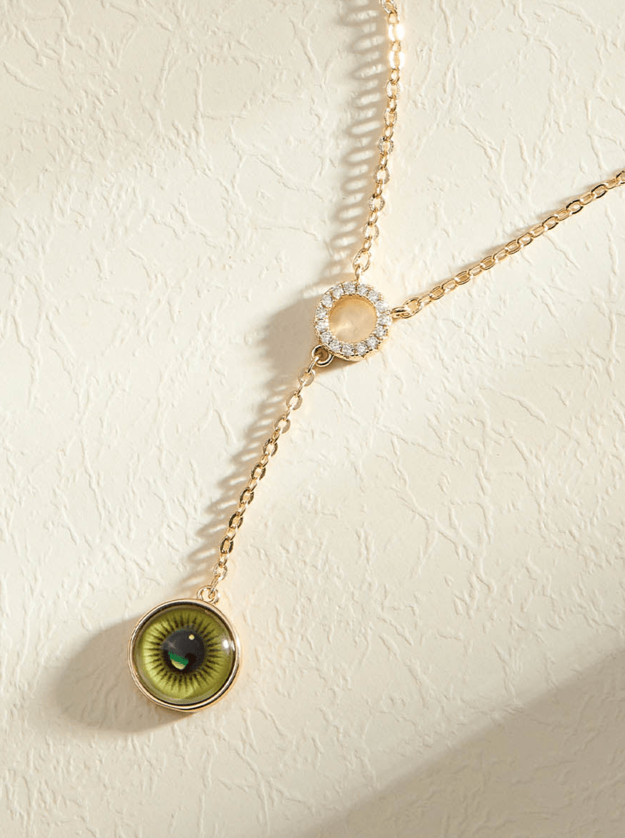 Beruzu - Gold Plated Necklace with Circular Stone Pendant and Eye-Enamel Dangle