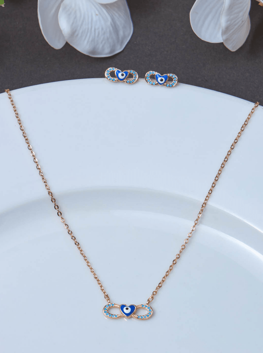 Beruzu - Celestial Infinity Pendant Set with Blue Enamel Accents and Eye-Centered Heart