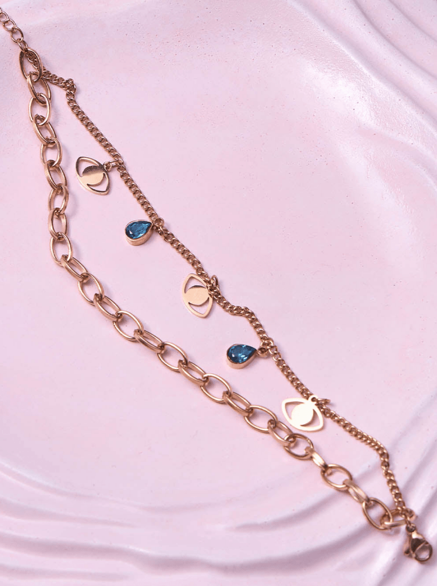 Beruzu - Gold Finish Dual Chain Bracelet with Eye Charms and Blue Stones