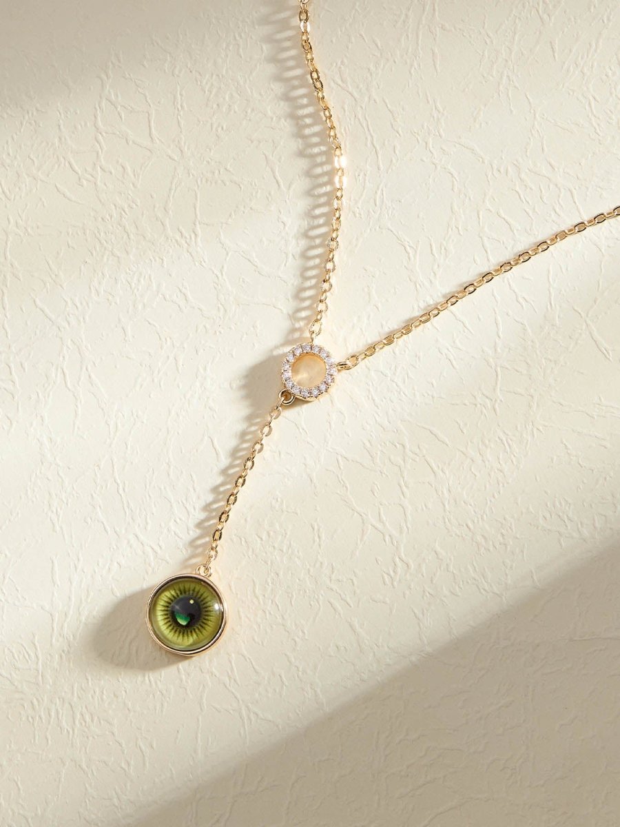 Beruzu - Gold Plated Necklace with Circular Stone Pendant and Eye-Enamel Dangle