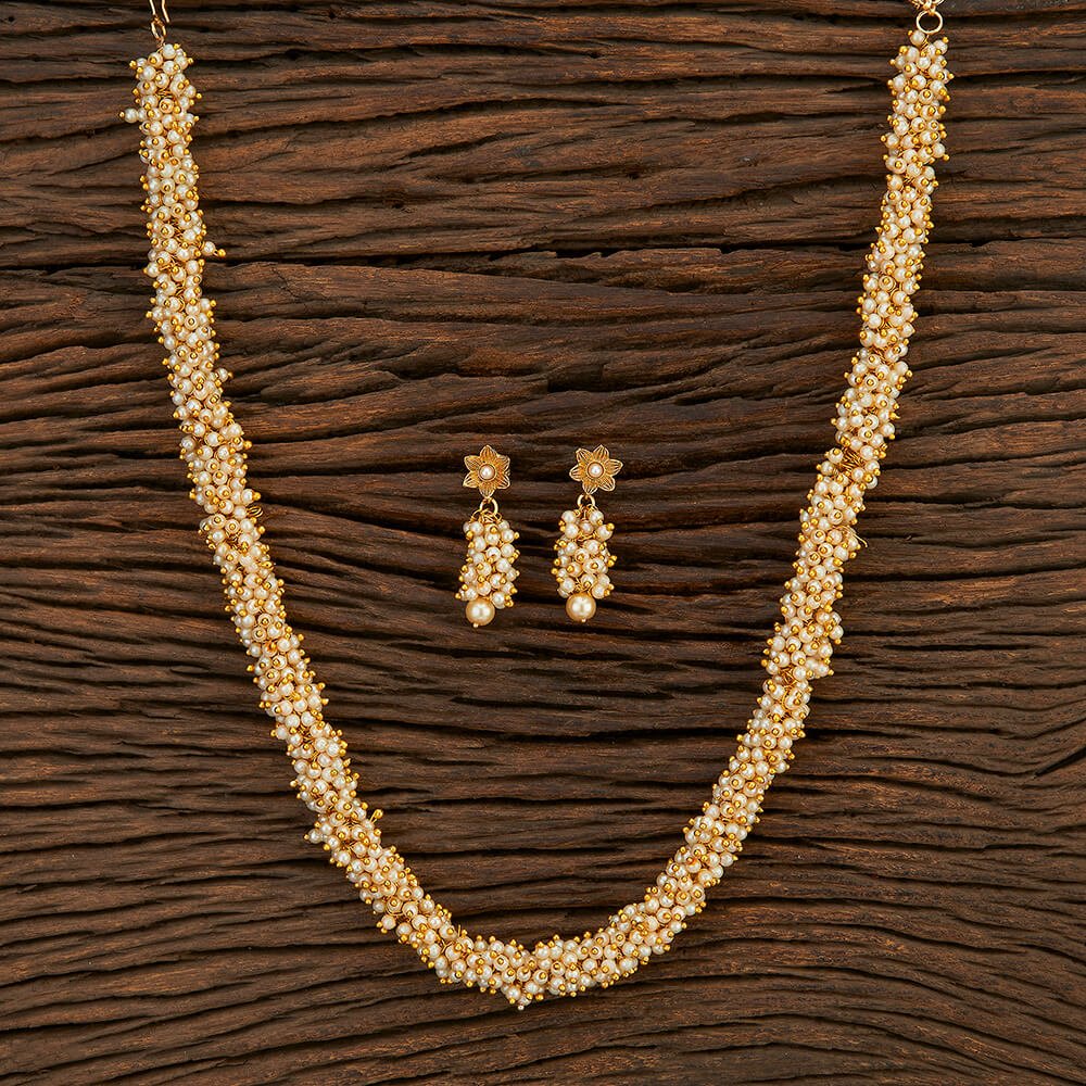 Beruzu - Intricately Handcrafted Gold - Plated Pearl Cluster Necklace with Floral Drop Earrings - Beruzu