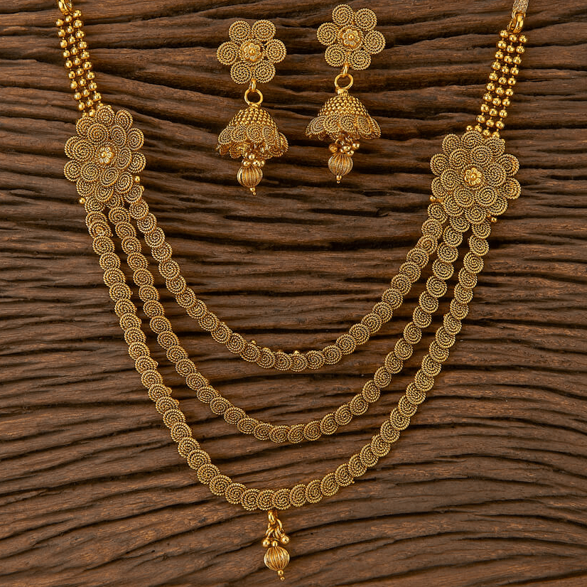 Beruzu - Multi - Strand Gold - Plated Necklace Set with Floral Motifs and Intricate Jhumka Earrings - Beruzu