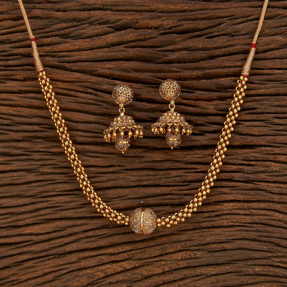 Beruzu - Multi - Strand Necklace Set with Filigree Spherical Pendant and Jhumka Earrings - Beruzu