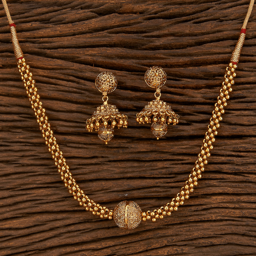 Beruzu - Multi - Strand Necklace Set with Filigree Spherical Pendant and Jhumka Earrings - Beruzu