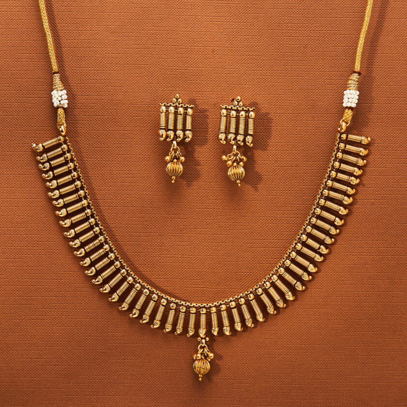 Beruzu - Ornate Gold - Plated Necklace and Earrings Set with Linear Bead Detailing - Beruzu