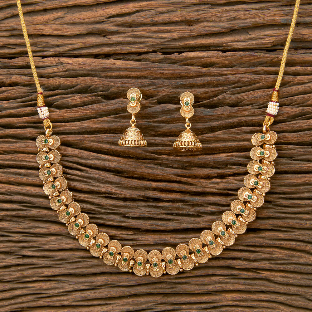 Beruzu - Ornate Leaf - Inspired Motifs and Jhumka Earrings Gold - Plated Necklace Set - Beruzu