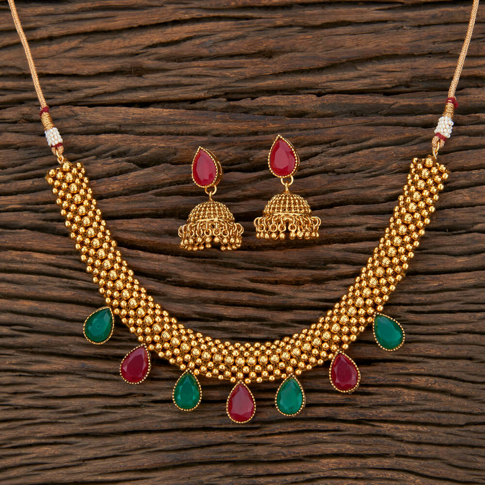 Beruzu - Textured Beadwork with Green and Red Teardrop Accents - Beruzu